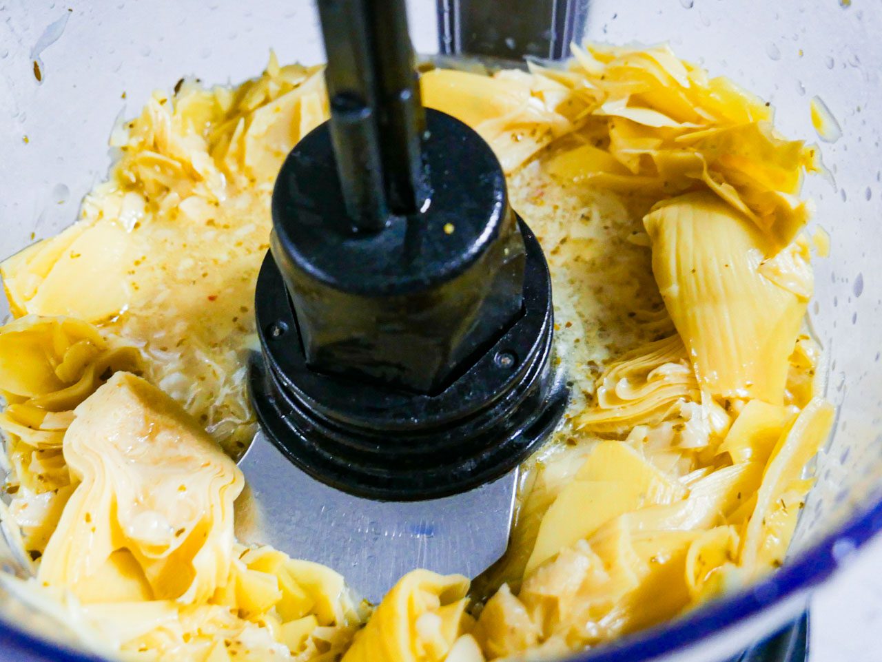 Creamy Artichoke Sauce with Capers - artichokes in a food processor