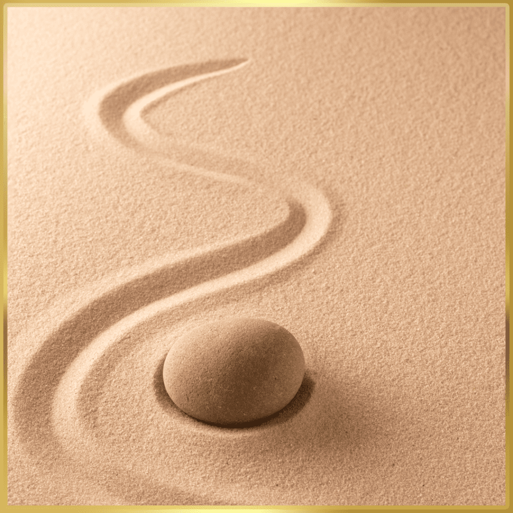 Line in the sand drawn around a ball of sand to show mindfulness and self-directed neuroplasticity